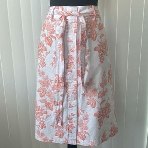 Liz Claiborne NWOT
Beautiful coral/peach floral on white skirt, Size 10 new